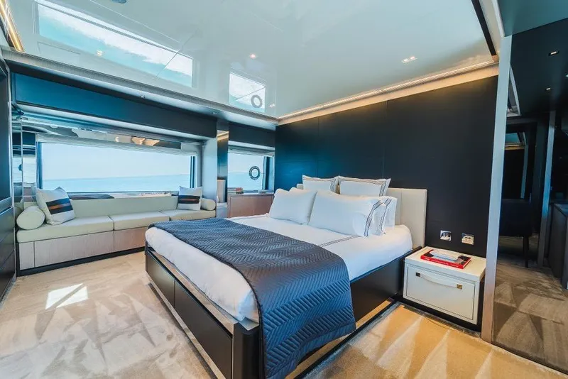 Slide: The Image of Luxurious bedroom interior of 2022 Riva 90' Argo yacht with ocean view. - 16