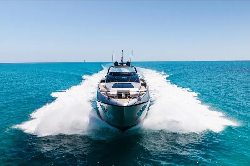 Slide: The Image of Luxury Riva 90' Argo yacht cruising on clear blue ocean, 2022 model. - 3