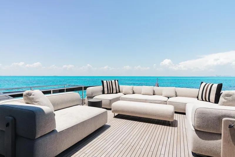 Slide: The Image of Luxurious deck seating on 2022 Riva 90' Argo yacht with ocean view. - 38
