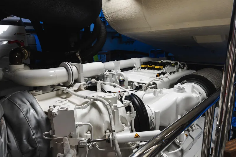 Slide: The Image of Engine room of 2022 Riva 90' Argo yacht, showcasing intricate machinery and components. - 52