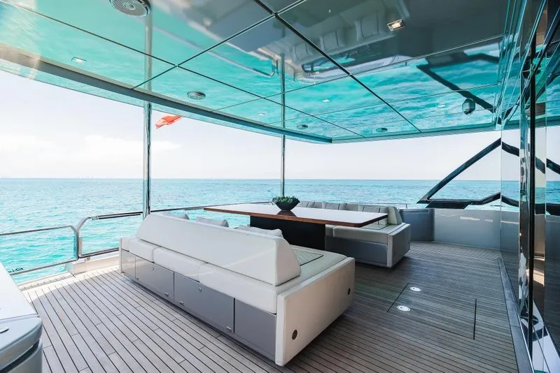 Slide: The Image of Luxurious deck of 2022 Riva 90' Argo yacht with ocean view and elegant seating. - 10