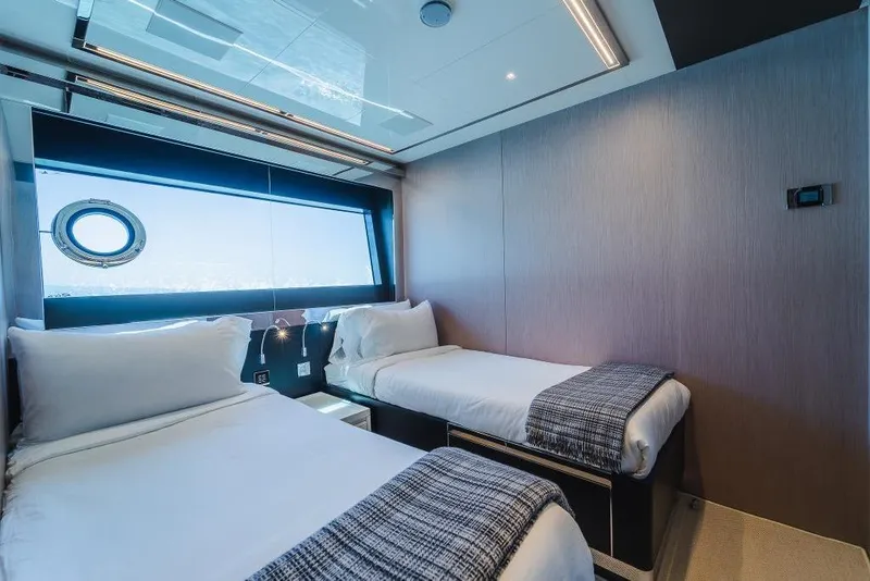 Slide: The Image of Luxurious twin cabin interior on 2022 Riva 90' Argo yacht with modern design. - 28