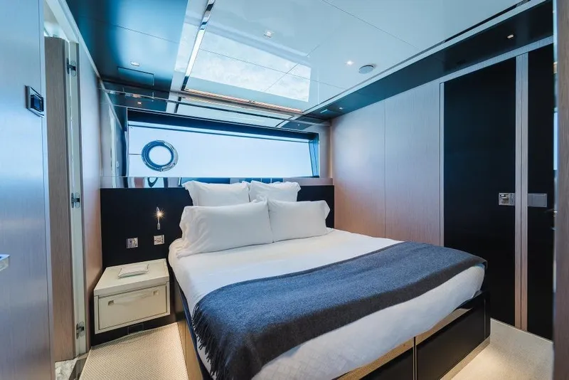 Slide: The Image of Luxurious bedroom interior on 2022 Riva 90' Argo yacht with modern design. - 24