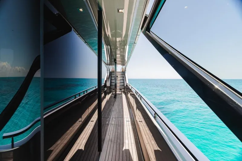 Slide: The Image of Luxurious 2022 Riva 90' Argo yacht deck with stunning ocean view. - 45