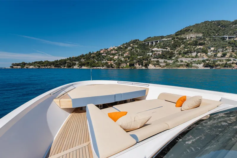 Slide: The Image of Luxurious Sanlorenzo SL106A yacht deck with scenic coastal view, 2022 model. - 38