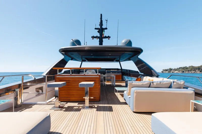 Slide: The Image of Luxurious 2022 Sanlorenzo SL106A yacht deck with seating and ocean view. - 29