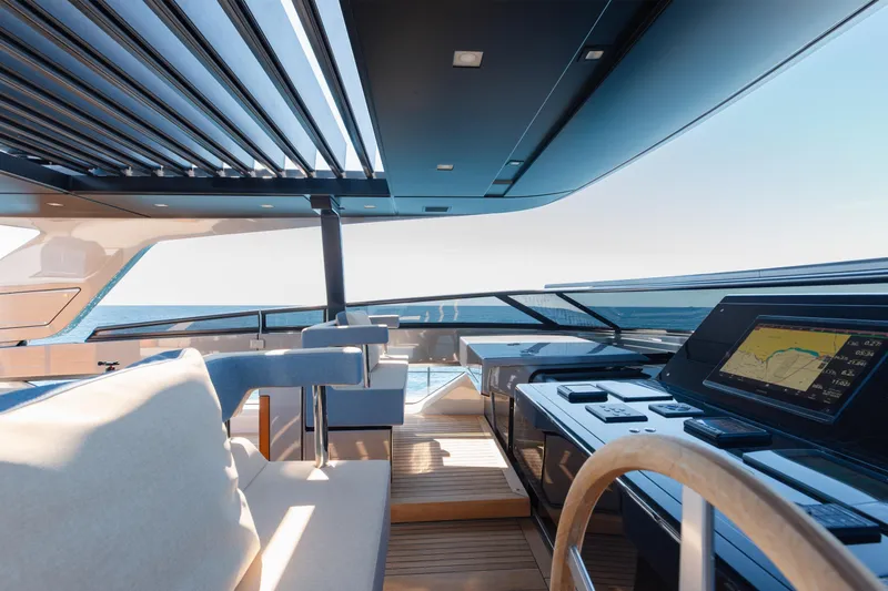 Slide: The Image of Luxurious 2022 Sanlorenzo SL106A yacht interior with modern navigation system and ocean view. - 34