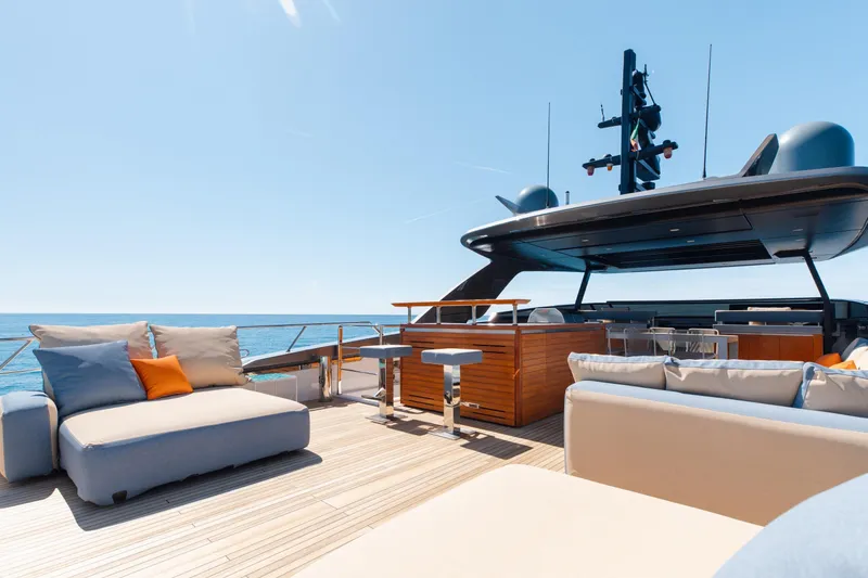 Slide: The Image of Luxurious 2022 Sanlorenzo SL106A yacht deck with modern seating and ocean view. - 35