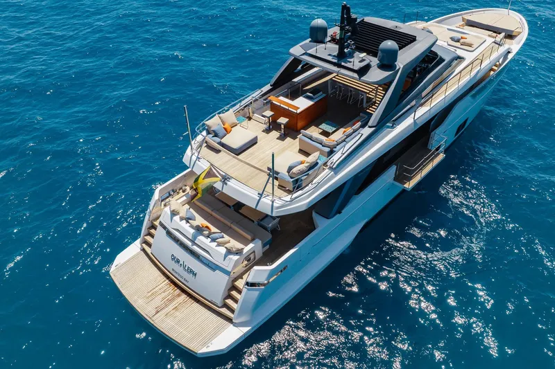 Slide: The Image of Luxurious 2022 Sanlorenzo SL106A yacht cruising on clear blue ocean waters. - 46