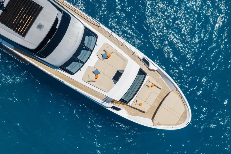 Slide: The Image of Aerial view of 2022 Sanlorenzo SL106A yacht on sparkling blue water. - 39