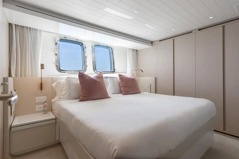 Slide: The Image of Luxurious bedroom interior on 2022 Sanlorenzo SL106A yacht with modern design and ocean view. - 21