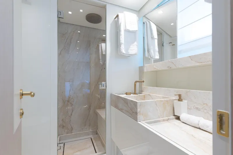 Slide: The Image of Luxurious bathroom on 2022 Sanlorenzo SL106A yacht with marble finishes and modern fixtures. - 24