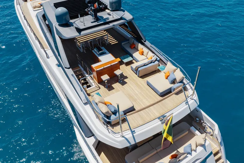 Slide: The Image of Luxurious 2022 Sanlorenzo SL106A yacht with spacious deck and elegant seating on blue ocean. - 45