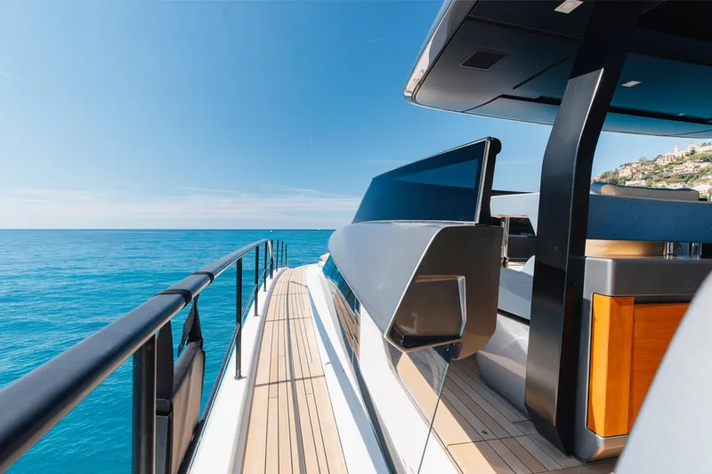 Slide: The Image of Sanlorenzo SL106A 2022 yacht deck with sleek design, cruising on clear blue waters. - 28