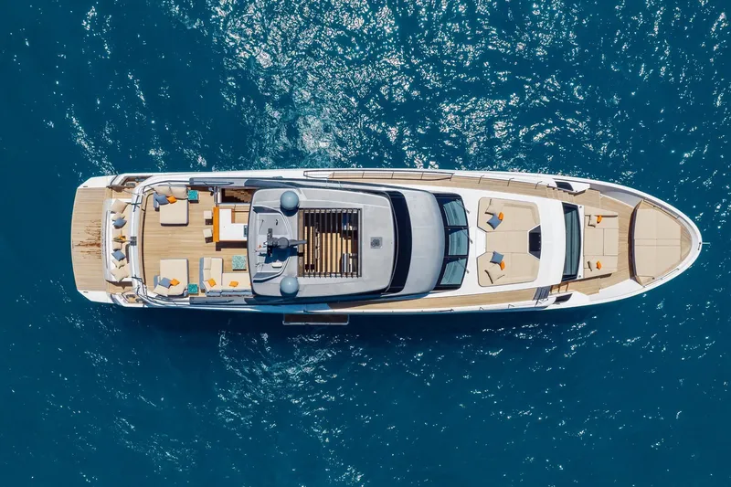Slide: The Image of Aerial view of 2022 Sanlorenzo SL106A luxury yacht on blue ocean water. - 44