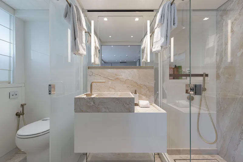 Slide: The Image of Luxurious bathroom on 2022 Sanlorenzo SL106A yacht with modern fixtures and marble accents. - 20
