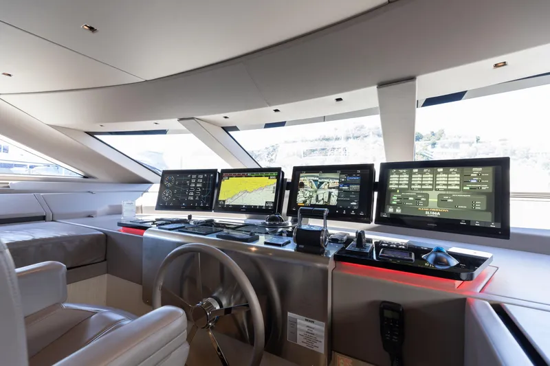 Slide: The Image of Modern helm of 2022 Sanlorenzo SL106A yacht with advanced navigation displays. - 27