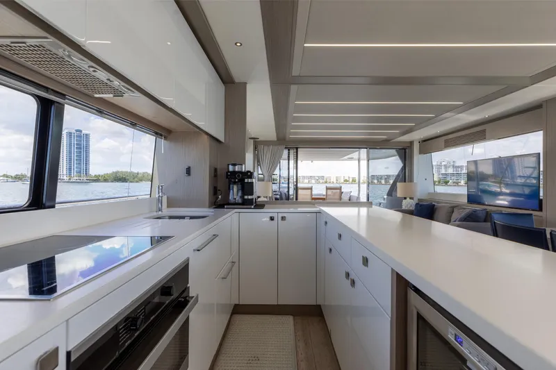 Slide: The Image of Luxurious interior of 2022 Sunseeker 76 Yacht with modern kitchen and scenic views. - 39