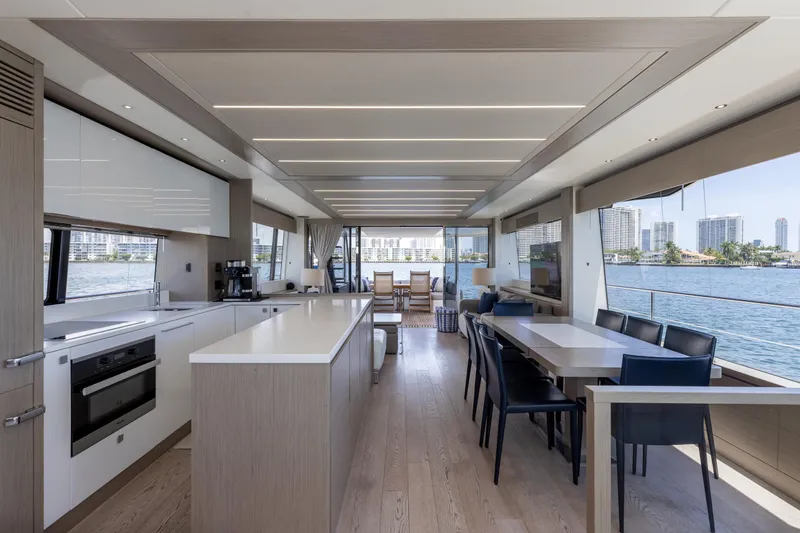 Slide: The Image of Luxurious interior of 2022 Sunseeker 76 Yacht with modern kitchen and dining area. - 42