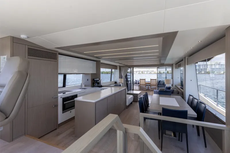 Slide: The Image of Luxurious interior of 2022 Sunseeker 76 Yacht with modern kitchen and dining area. - 40