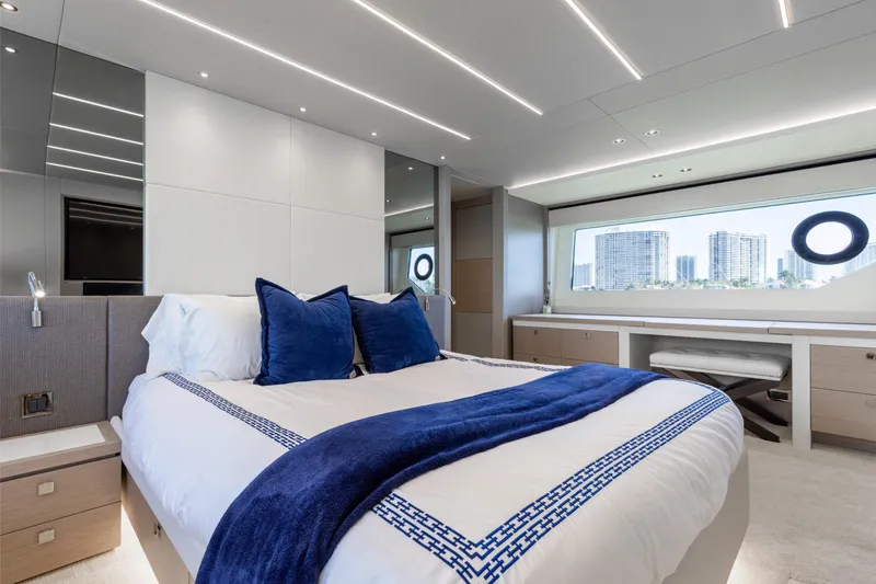 Slide: The Image of Luxurious bedroom interior of 2022 Sunseeker 76 Yacht with modern design and cityscape view. - 46