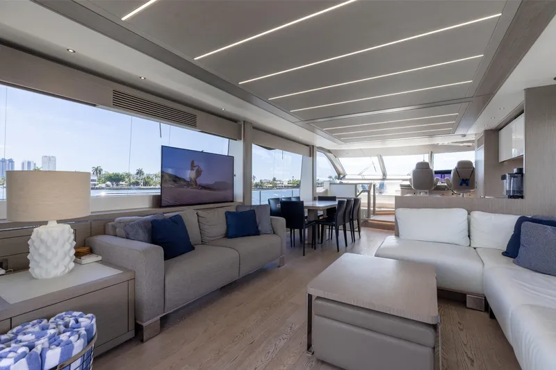 Slide: The Image of Luxurious interior of 2022 Sunseeker 76 Yacht with modern furnishings and panoramic windows. - 35
