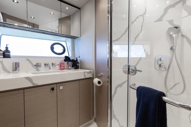 Slide: The Image of Luxurious bathroom in 2022 Sunseeker 76 Yacht with modern fixtures and elegant design. - 58