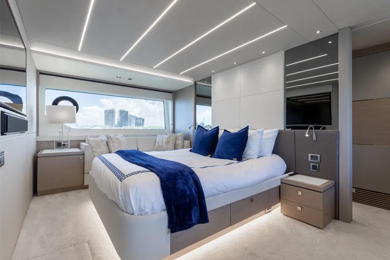 Slide: The Image of Luxurious bedroom interior of 2022 Sunseeker 76 Yacht with modern design and large window view. - 44