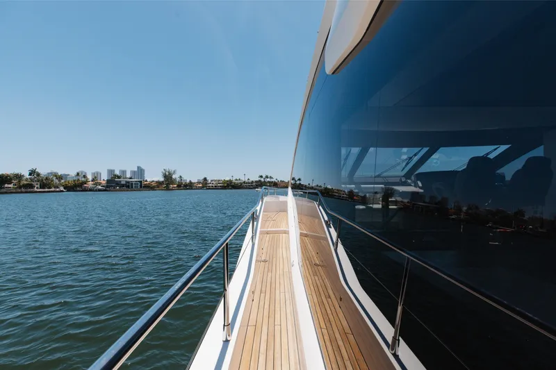 Slide: The Image of Luxurious 2022 Sunseeker 76 Yacht cruising on serene waters, showcasing sleek design and elegance. - 67