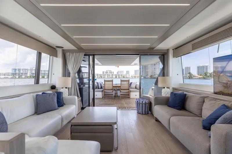 Slide: The Image of Luxurious interior of 2022 Sunseeker 76 Yacht with modern furnishings and waterfront view. - 32