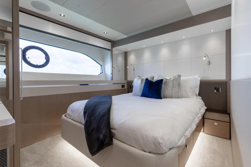 Slide: The Image of Luxurious bedroom interior of 2022 Sunseeker 76 Yacht with modern design and elegant furnishings. - 52