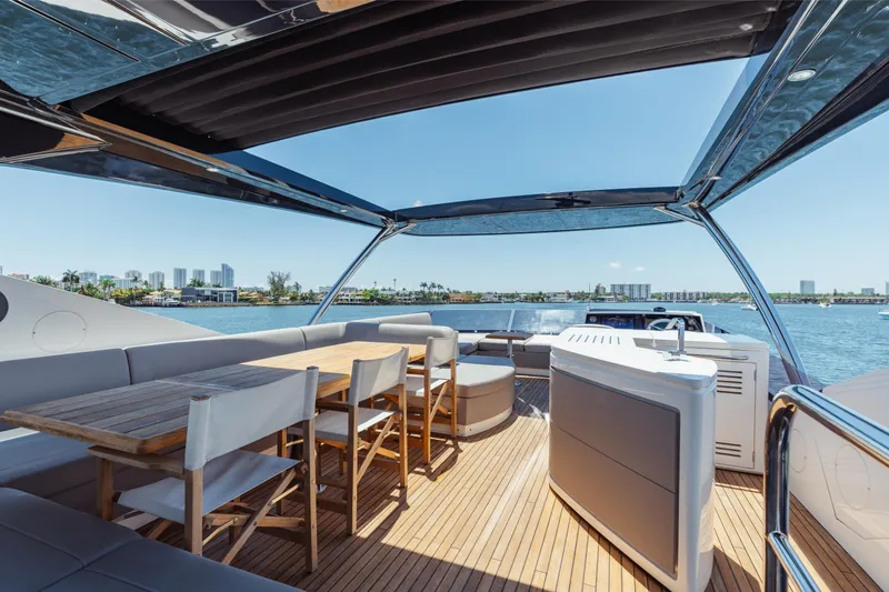 Slide: The Image of Luxurious Sunseeker 76 Yacht 2022 with spacious deck and elegant seating area. - 79