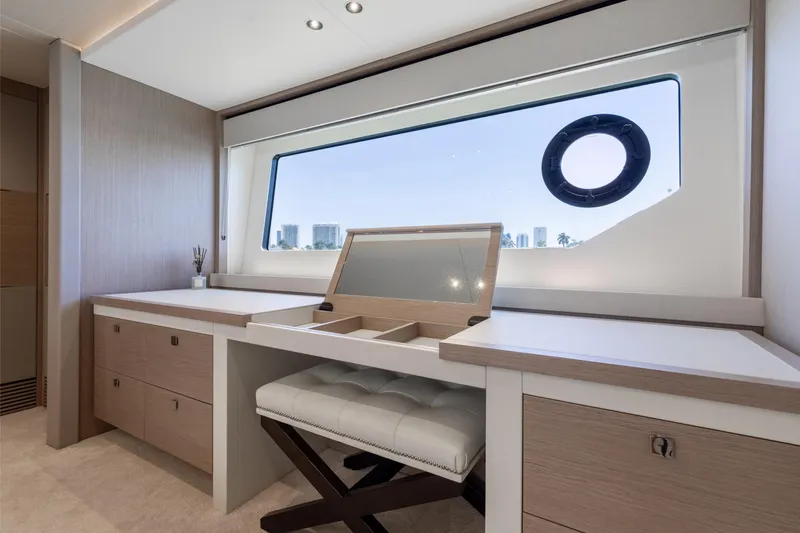 Slide: The Image of Luxurious interior of 2022 Sunseeker 76 Yacht with vanity and scenic window view. - 47