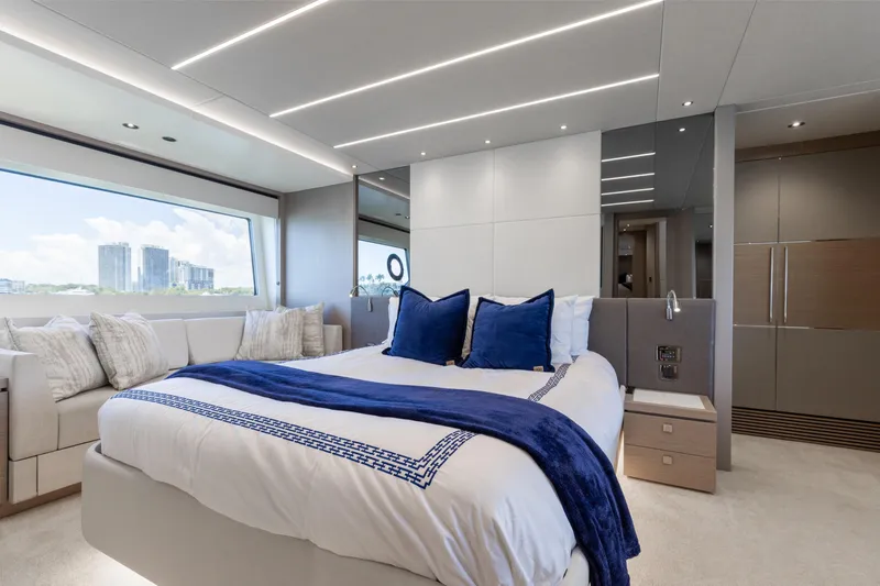 Slide: The Image of Luxurious bedroom interior of 2022 Sunseeker 76 Yacht with modern design and large window view. - 43