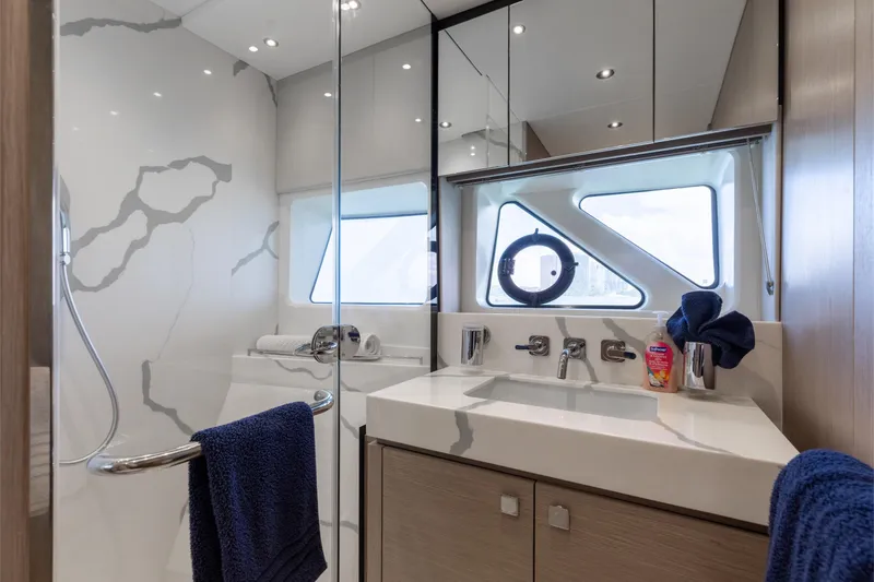 Slide: The Image of Luxurious bathroom in 2022 Sunseeker 76 Yacht with modern fixtures and elegant design. - 54