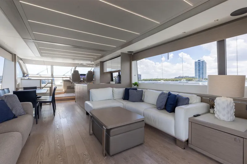 Slide: The Image of Luxurious interior of 2022 Sunseeker 76 Yacht with modern furnishings and panoramic windows. - 36