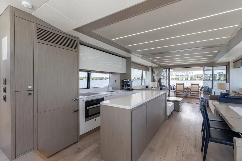 Slide: The Image of Luxurious interior of 2022 Sunseeker 76 Yacht with modern kitchen and spacious seating area. - 38