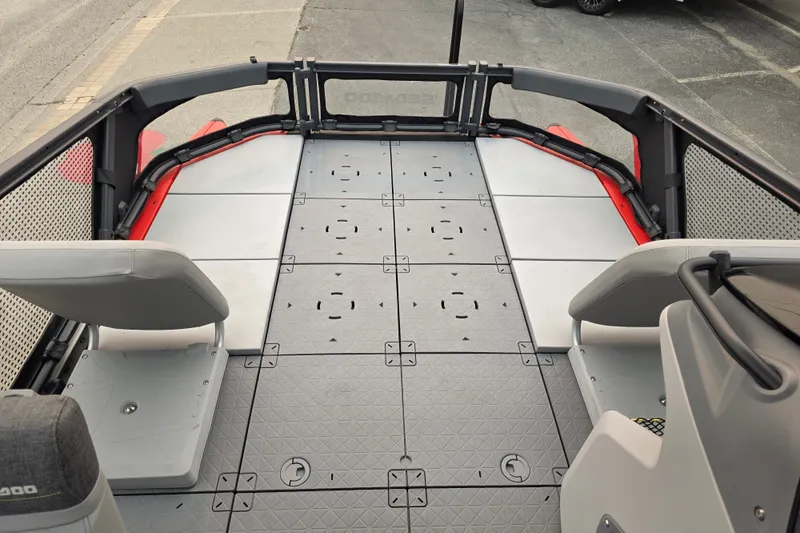 Slide: The Image of 2024 Seadoo Switch Sport deck with modular seating and non-slip flooring. - 13