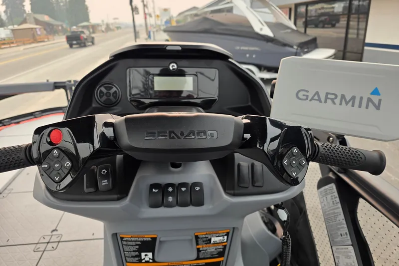 Slide: The Image of 2024 Seadoo Switch Sport dashboard with Garmin navigation system and control panel. - 9