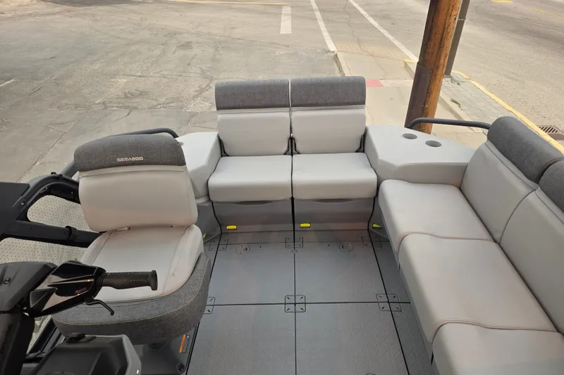 Slide: The Image of 2024 Seadoo Switch Sport interior with gray seating and steering controls. - 7