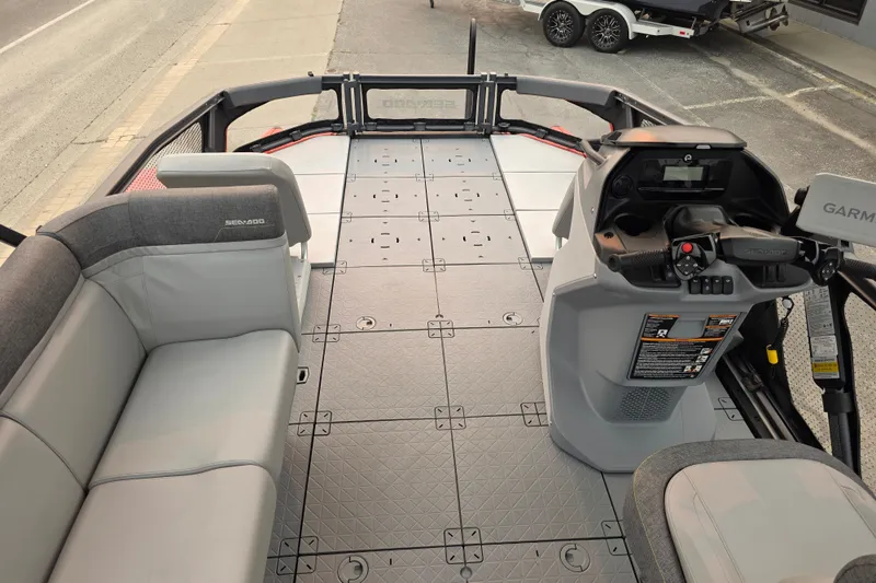 Slide: The Image of 2024 Seadoo Switch Sport interior with seating and control console, showcasing modern design. - 14