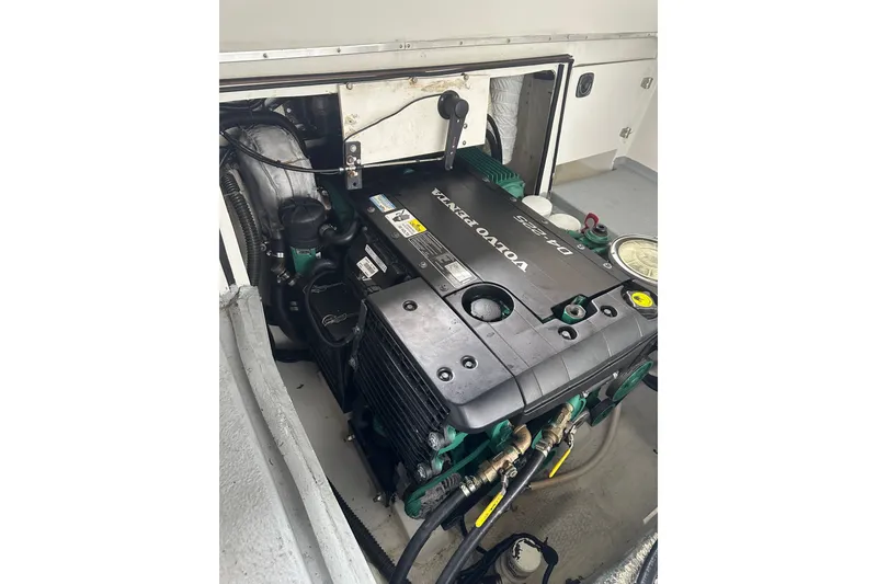 Slide: The Image of Engine compartment of a 1999 Skagit Orca 24 with Volvo Penta D4-225 engine. - 13