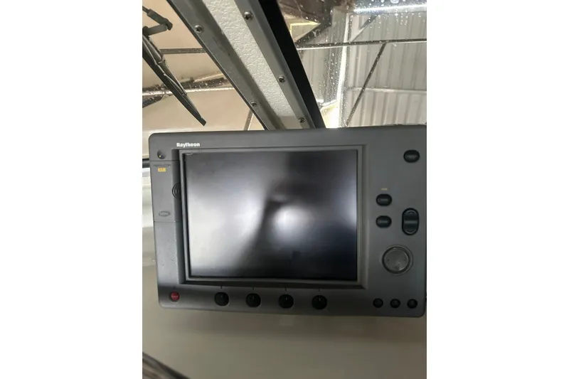Slide: The Image of Raytheon marine GPS system inside a 1999 Skagit Orca 24 boat. - 18