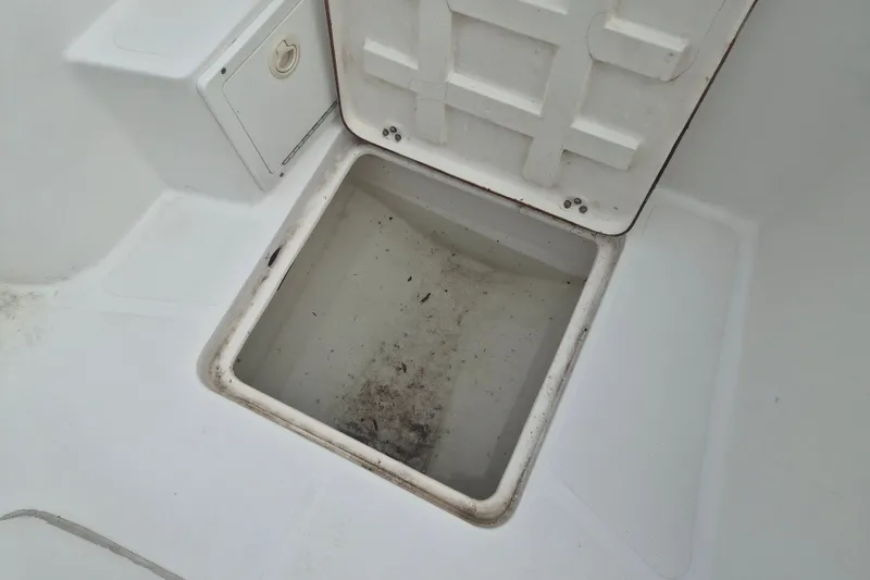 Slide: The Image of Open storage compartment on Kenner Vision 2103 boat, 2006 model. - 25