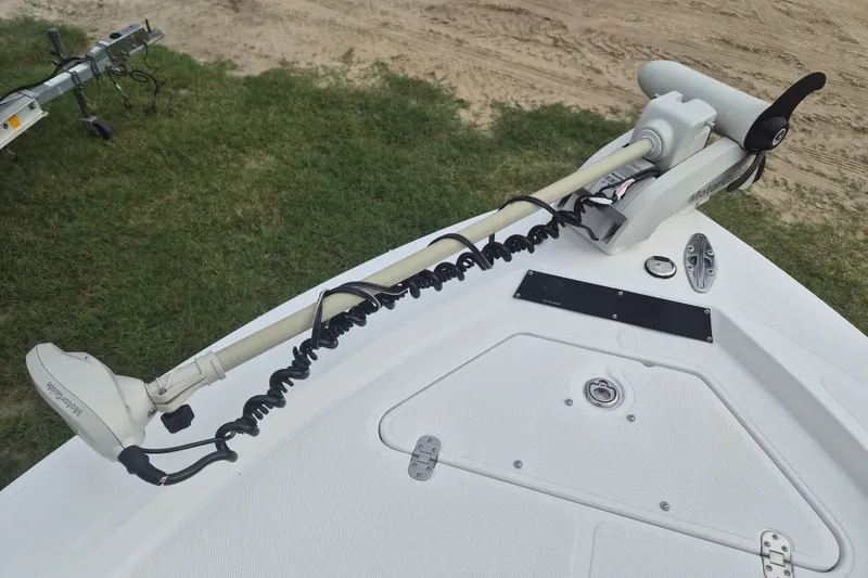 Slide: The Image of Kenner Vision 2103 boat with trolling motor, grassy background, 2006 model. - 29