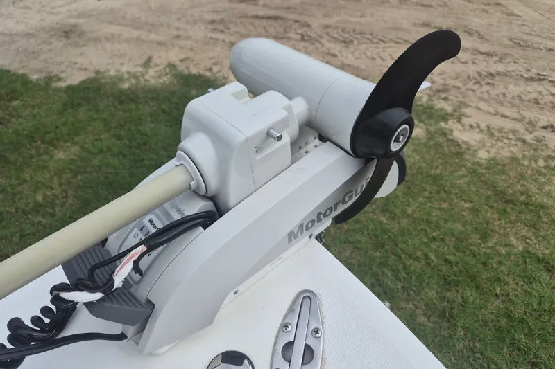 Slide: The Image of MotorGuide trolling motor on Kenner Vision 2103 boat, 2006 model, with propeller detail. - 30