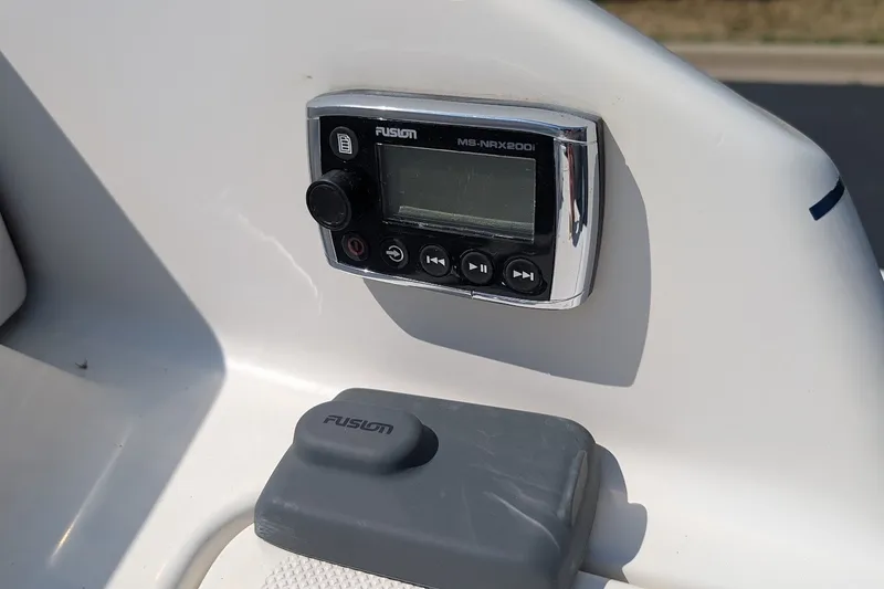 Slide: The Image of Fusion MS-NRX200i stereo control on 2002 Regal 2450 LSC boat dashboard. - 16