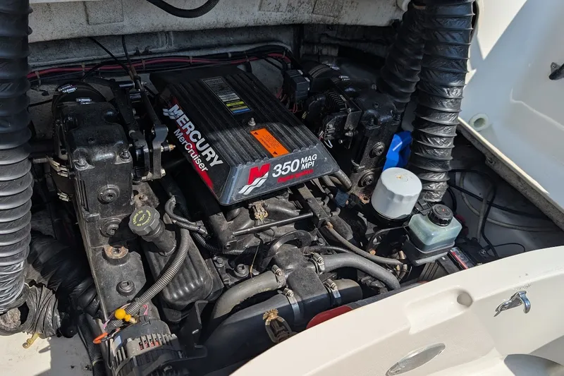 Slide: The Image of Engine compartment of a 2002 Regal 2450 LSC boat with Mercury MerCruiser 350 MAG MPI. - 44