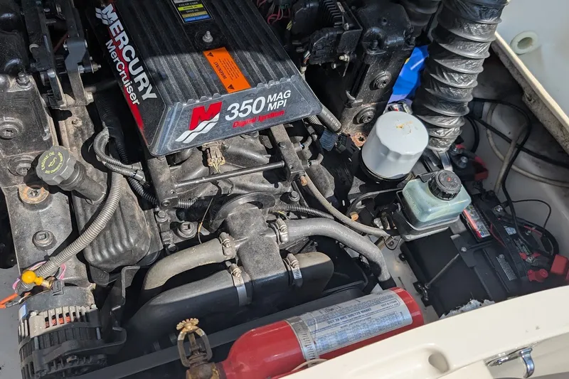 Slide: The Image of Engine compartment of a 2002 Regal 2450 LSC with Mercury 350 MAG MPI motor. - 43