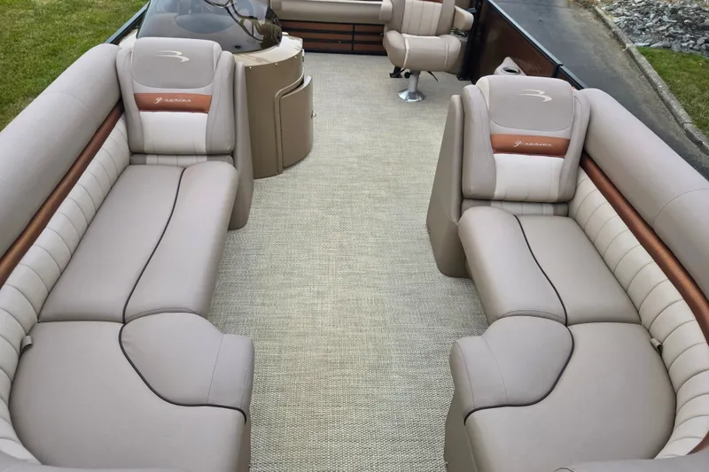 Slide: The Image of Luxurious interior of a 2017 Bennington G 23 GSBA pontoon boat with plush seating. - 10